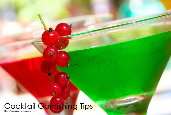 green cocktail garnished with berries