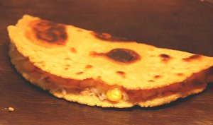 Flipping the tortilla in half