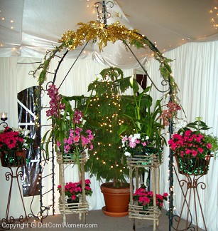 Arches, Seasonal Flowers, Potted Plants all add to the wedding hall decor