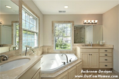 Beige Master Bathroom with Windows and Luxurious Bathtub