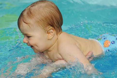 Acclimatise your baby to being in water before swimming