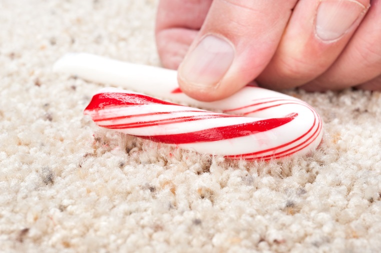 candy cane on carpet - Tips for cleaning carpets in winter