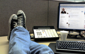 employee browsing social media site at work