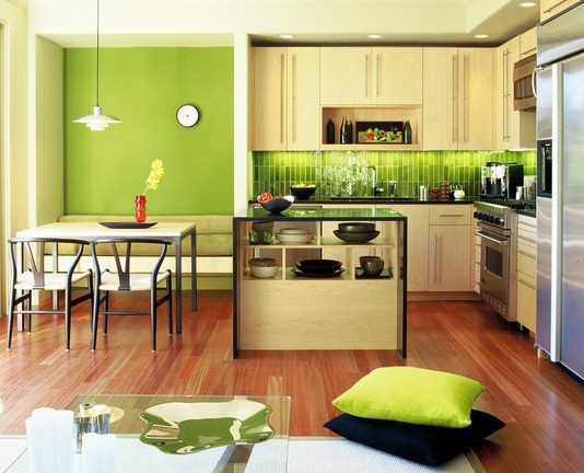 green backsplash and wood flooring kitchen design