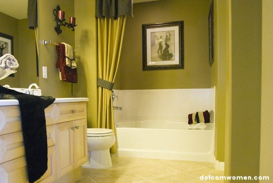 green bathroom with shower curtain