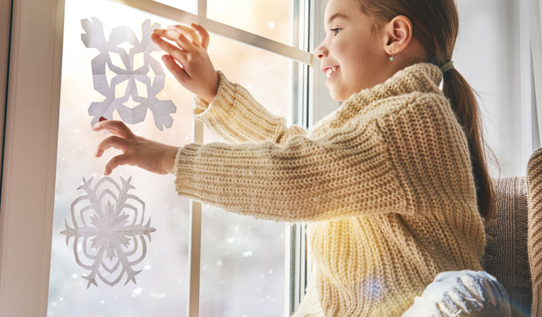 Paper Snowflakes on Window