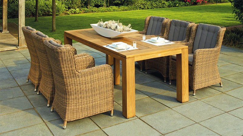 Pressure wash outdoor patio furniture