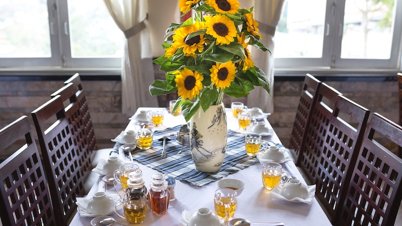 Dining Table with Sunflowers Centerpiece